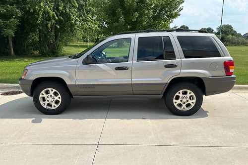 99-04 Grand Cherokee Par Manijas Exteriores Delant. S/llave
